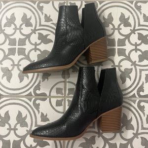 Heeled Black snakeskin boots